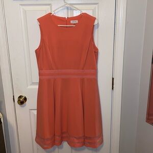 Peach strapless formal knee length dress